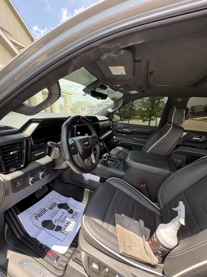 GMC Sierra cabin with leather seats freshly detailed
