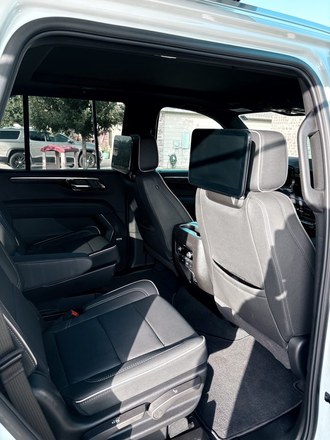 Detailed Chevrolet Tahoe second row seats and rear cabin after an interior detail